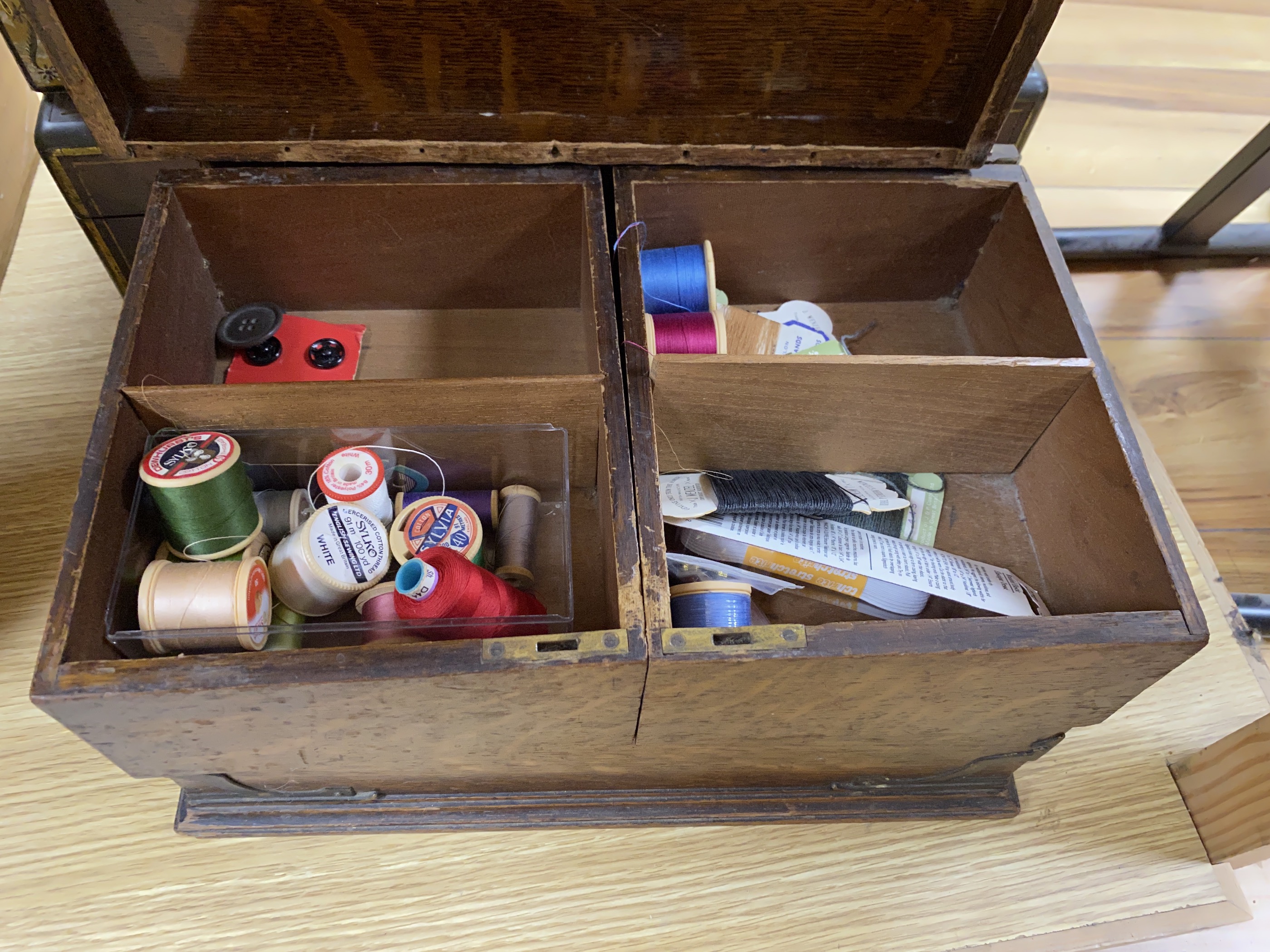 A George III mahogany and brass bound writing slope, a painted sewing box and an oak brass mounted sewing box, (3), writing slope 45cm wide x 26cm deep